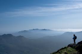 hiker at cliff's edge